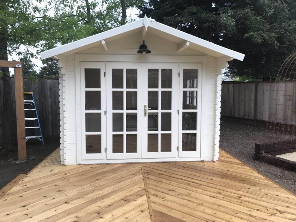 SolidBuild garden shed kit built on wooden deck